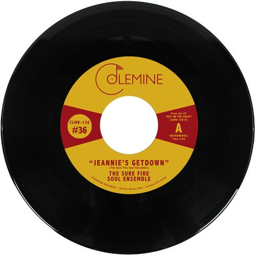 Black vinyl record with yellow and red label, displaying “Jeannie’s Getdown.”