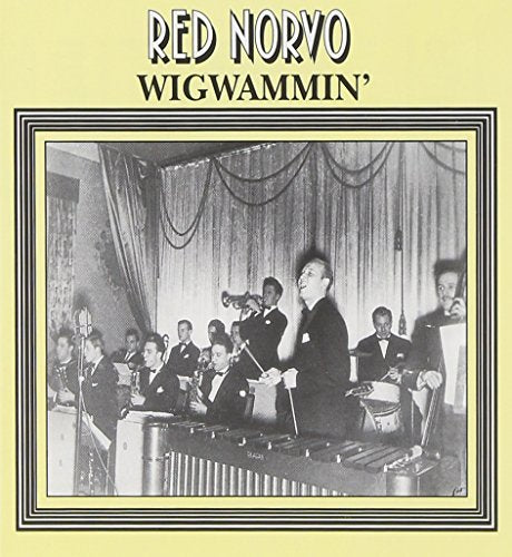 Black and white photo of a jazz band with a marimba player.
