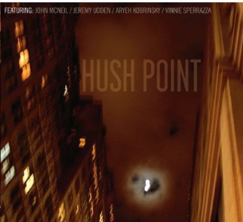 CD cover for "Hush Point" featuring blurred city buildings at night.