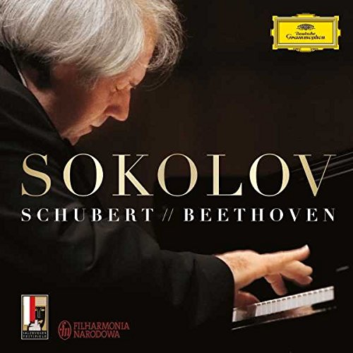 An older man with white hair playing a piano, album cover for classical music.