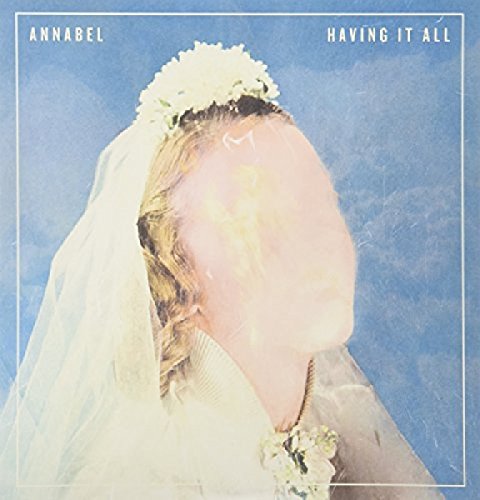 Vinyl album cover featuring a woman in a white wedding veil and flowers.