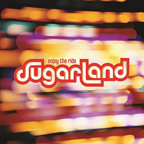CD cover for Sugarland’s “Enjoy the Ride” with blurred lights.