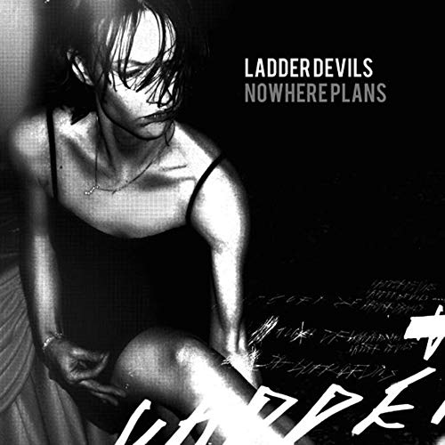Black and white album cover featuring a person with wet hair.
