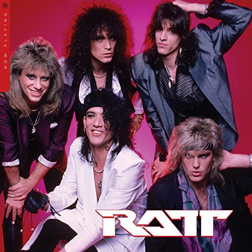 1980s rock band Ratt posing for album cover, pink background.