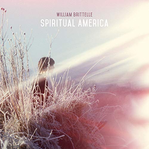 "Album cover with silhouette of a person in tall grass, surrounded by light."