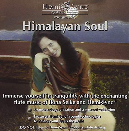 Woman holding a flute, sitting outdoors with mountains in the background, on a CD cover.