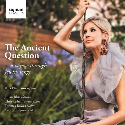 CD cover: blonde woman on a swing, garden background, text overlay.
