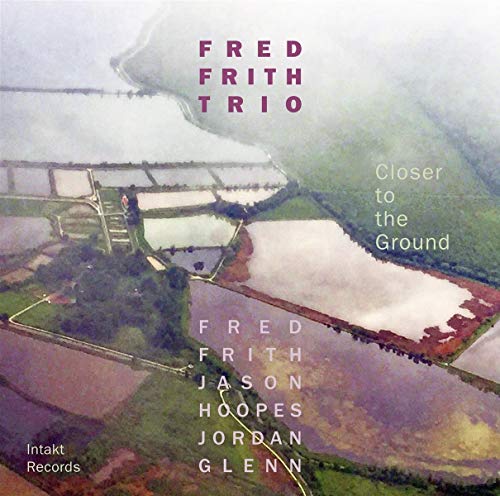 Aerial view of farmland with "Fred Frith Trio" and "Closer to the Ground" text.