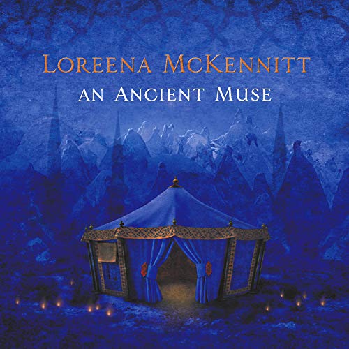 Blue album cover with a tent and mountainous, misty background.