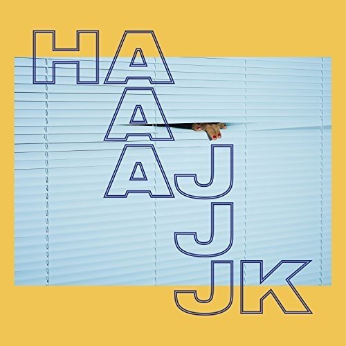 "Album cover with 'HAJK' text on yellow background, featuring a hand holding a paintbrush."