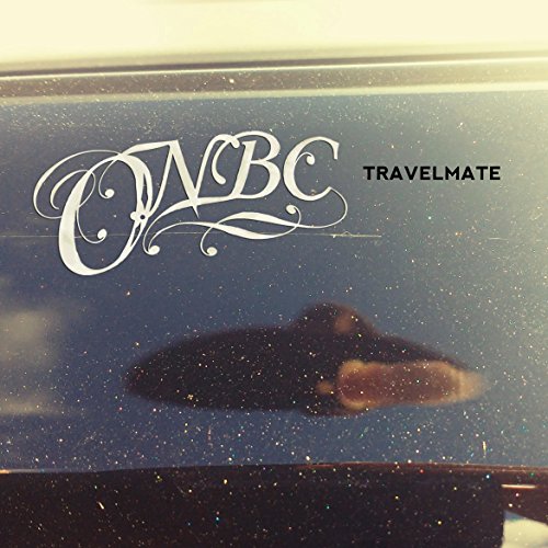White "ONBC" decal on a dark blue surface, with "TRAVELMATE" text beside it.