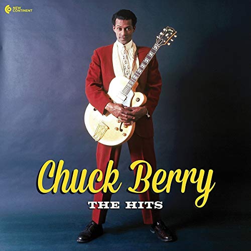 Chuck Berry in red suit with guitar on album cover.