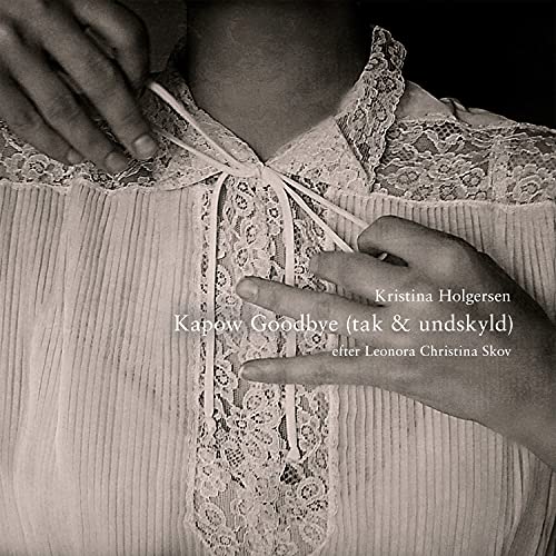 CD cover: hands adjusting a lace collar, black and white portrait.