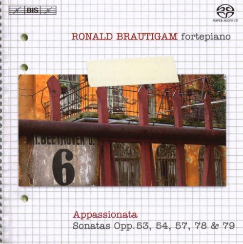 "CD cover with a photo of a red metal fence and yellow building."