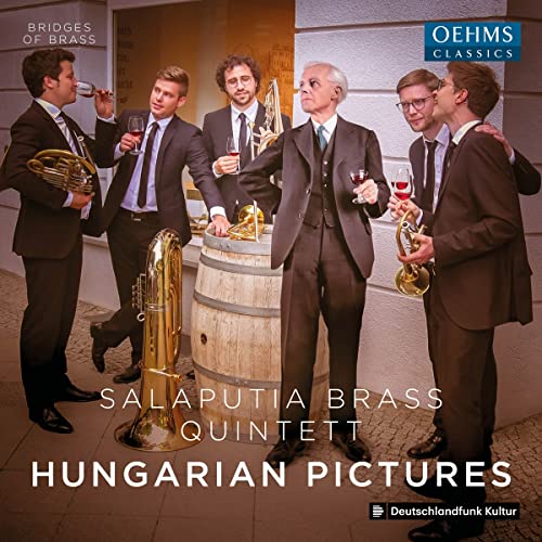 Salaputia Brass Quintet in suits with instruments and wine glasses.