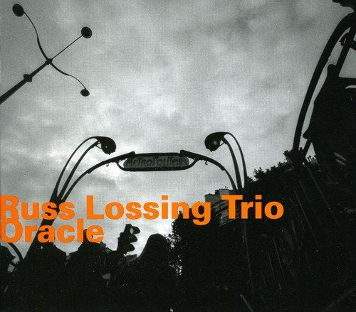 "Album cover with black and white rollercoaster image and orange text."