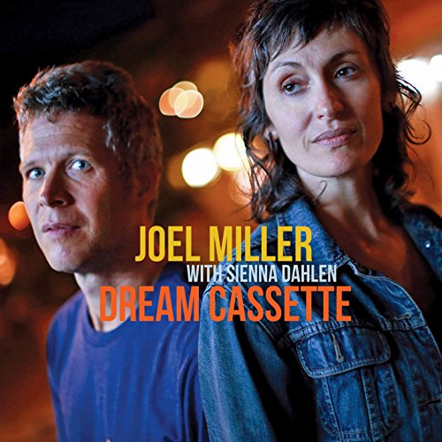 "CD cover featuring a man and woman with text 'Joel Miller Dream Cassette'."