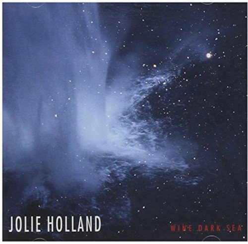 Album cover with dark blue, starry background and white, misty wave, featuring artist and album name.