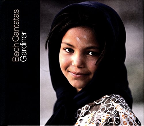 CD cover featuring a young woman with a headscarf, dark background.