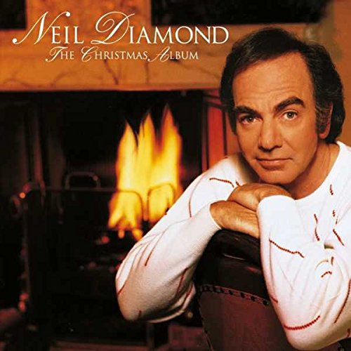 "Album cover featuring Neil Diamond in front of a fireplace, wearing a white sweater."