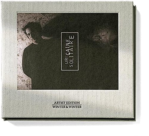 "Uri Caine - Solitaire CD cover with a dark-toned image and light grey border."