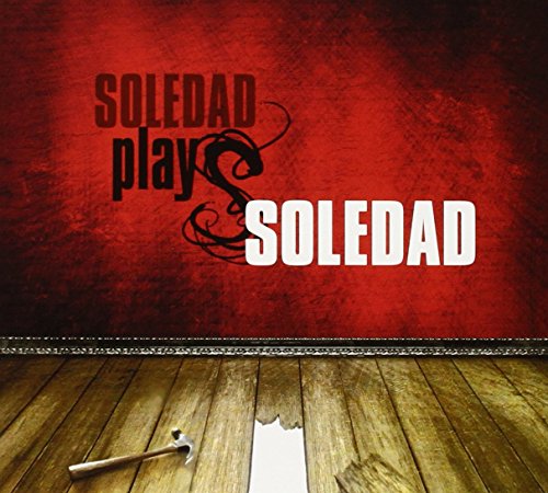"CD cover with red background, wooden floor, and hammer creating a hole."