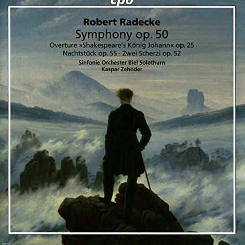 "Album cover with a man standing on a rocky outcrop, surrounded by misty mountains."