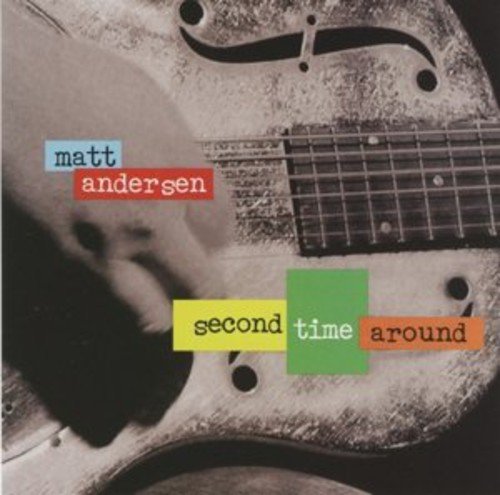 "Album cover featuring a black and white guitar image with multicolored text overlay."