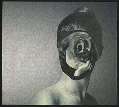 Black and white album cover with a woman’s face obscured by a rose.