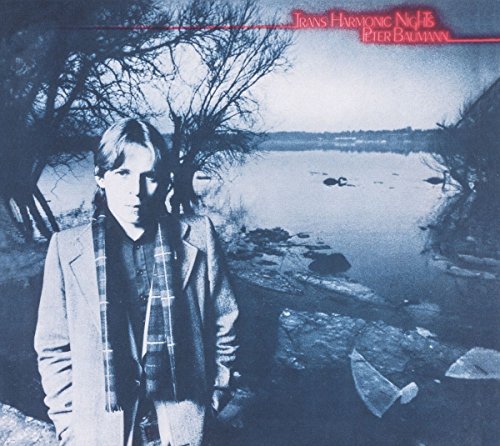 "Album cover featuring a man standing by a body of water, blue-toned image."