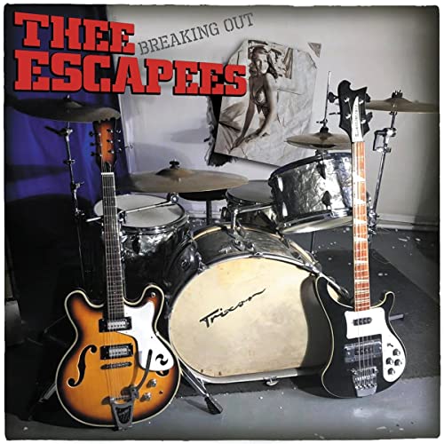 Vinyl album cover featuring a band with guitars and a drum kit.
