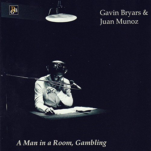 "CD cover featuring a man sitting at a desk, holding a violin bow."