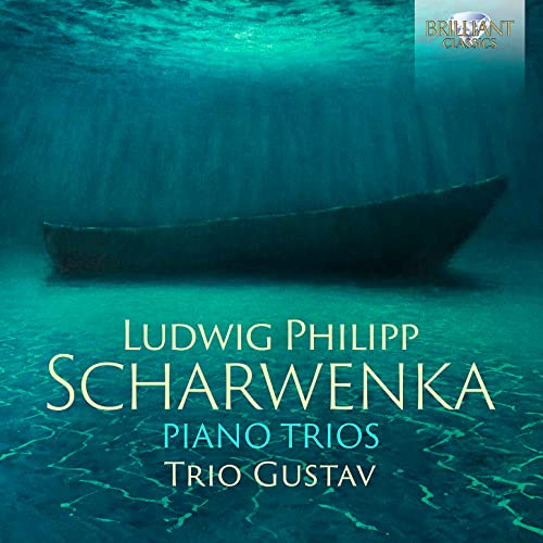 CD cover: dark teal abstract image with a small boat and text.
