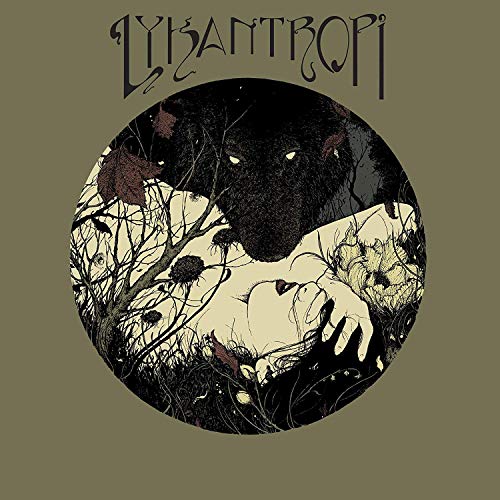 Record cover: wolf looming over a figure in a barren landscape.
