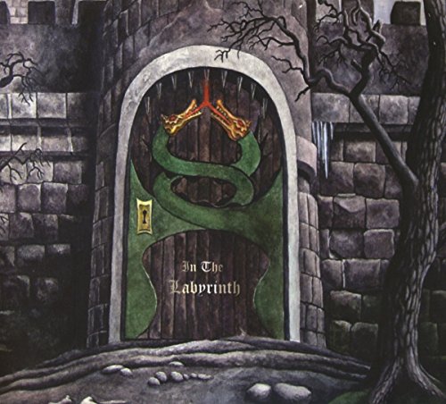 A stone tower door features a green serpent emblem and the text In The Labyrinth.