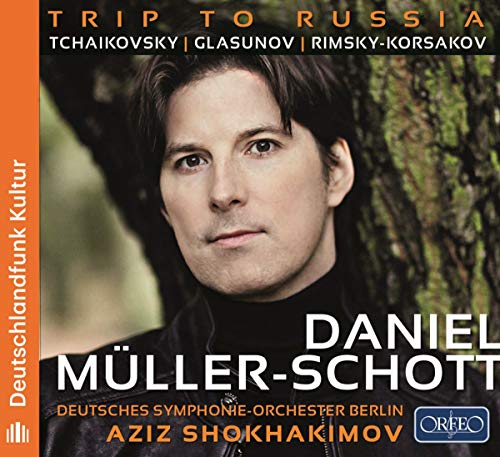 "CD cover with a man standing by a tree, classical music theme."