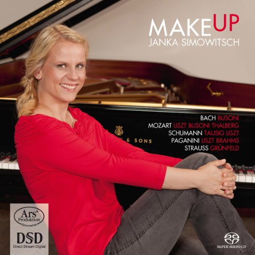 "CD cover featuring a woman in red sitting beside a grand piano."