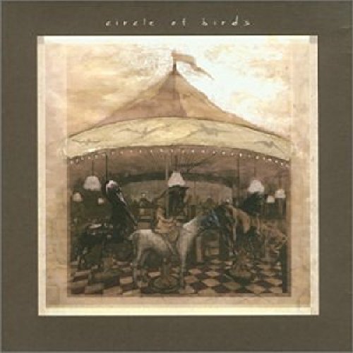 "Album cover with a vintage carousel illustration surrounded by a brown border."
