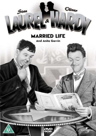 Laurel & Hardy DVD cover featuring Stan and Oliver at a table.