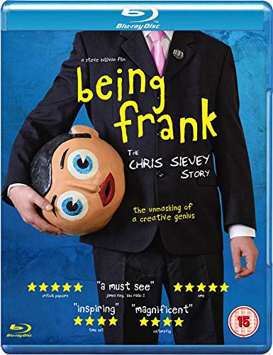 Blu-ray cover art featuring a man in a suit holding a large cartoon mask.