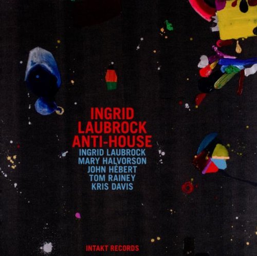 "Album cover with dark background, colorful paint splatters, and artist names in red and blue."