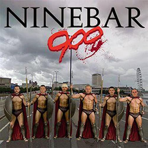 Six men in Spartan warrior costumes with spears and shields.