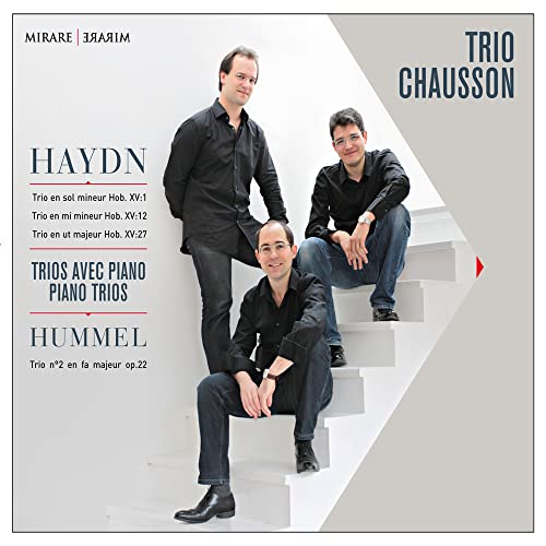 CD cover featuring three men in black shirts on a staircase.