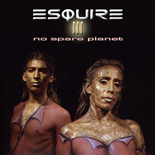 Album cover with man and woman, metallic body paint, against a dark background.