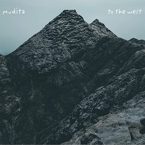 CD cover: a dark, moody photograph of a rugged mountain peak.