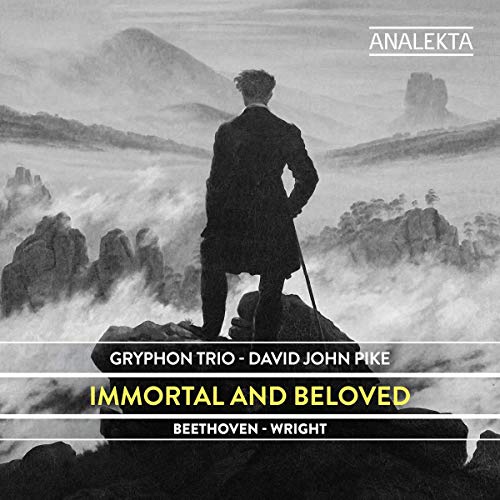 A black-and-white image of a man on a cliff, with text overlay.