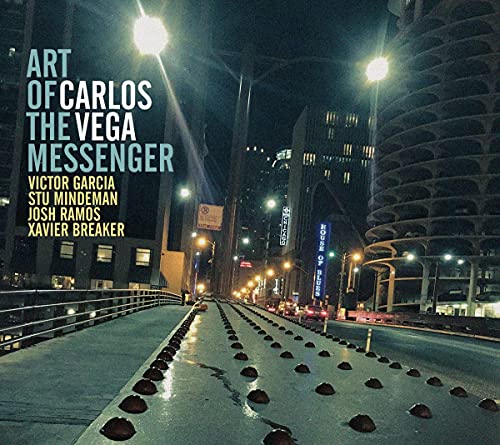 CD cover for Carlos Vega’s “Art Of The Messenger” with a city night scene.