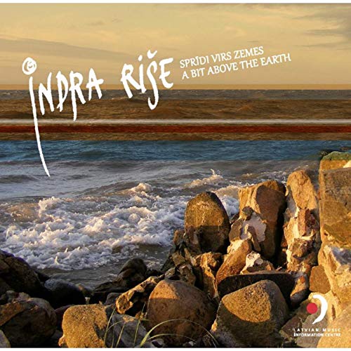 "Album cover with rocky shoreline, waves, and artist name 'Indra Rise' in white text."