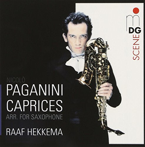 A man in a tuxedo holds a saxophone on a CD cover.