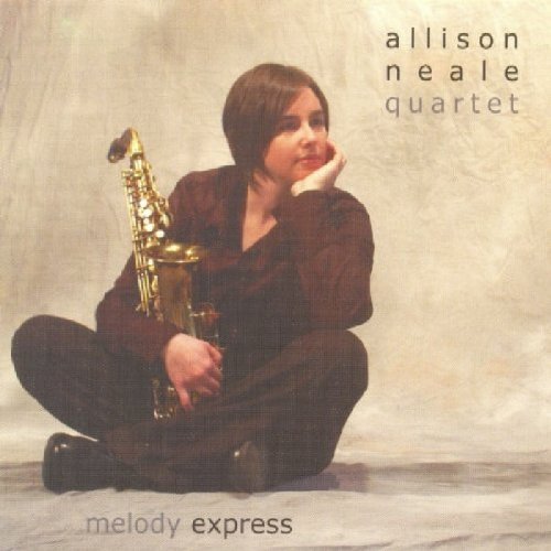 CD album cover featuring a woman holding a saxophone, sitting on the floor.